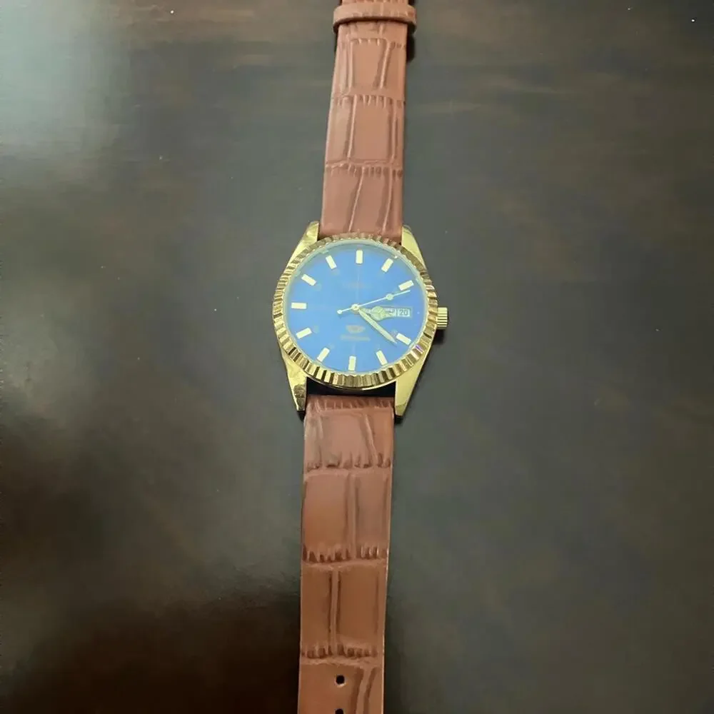 Citizen Gold Watch with Blue Dial and Tan Strap